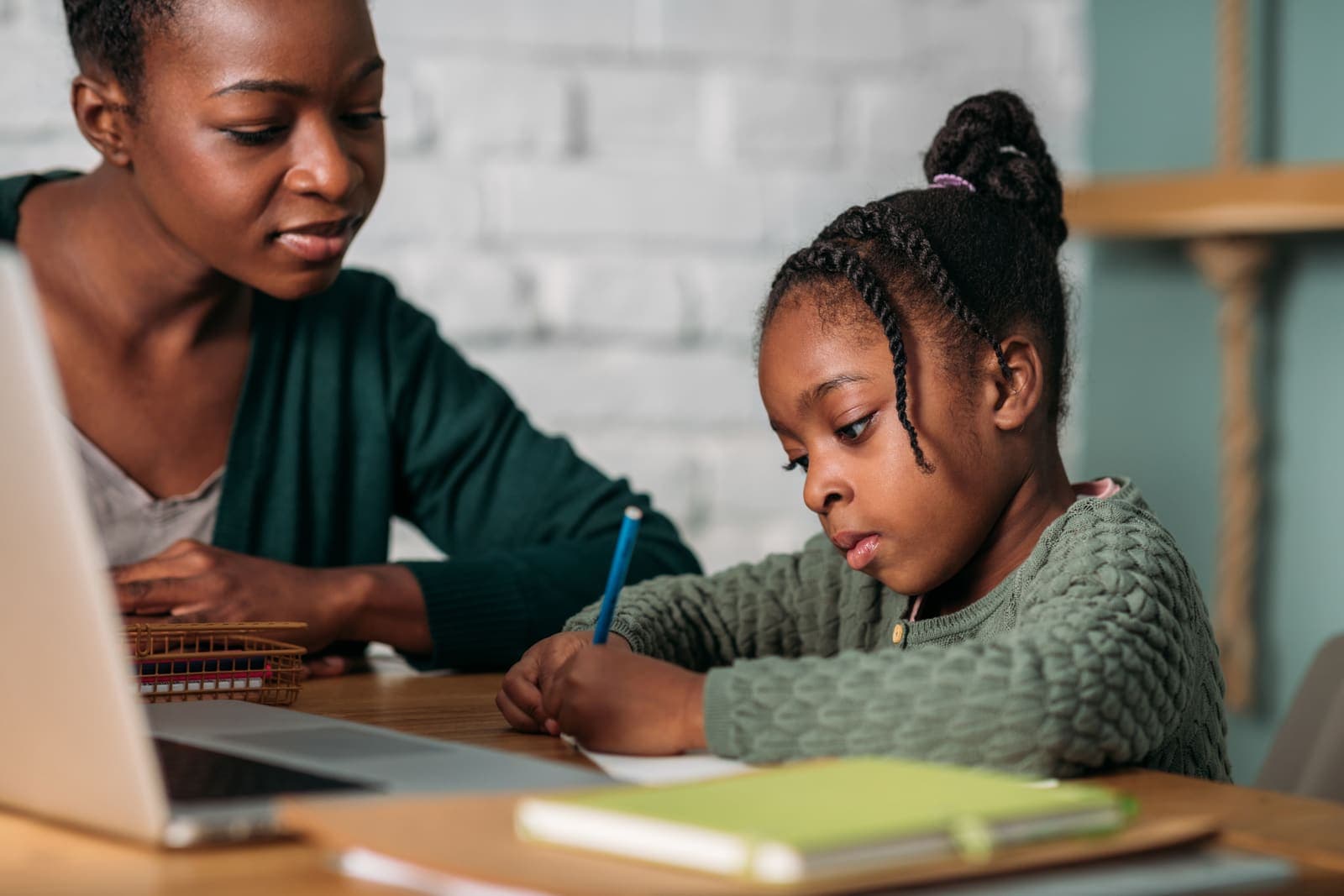 An alumna mentoring a young student
